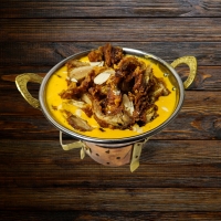 Knusprige Entenbrust in cremiger Korma-Sauce mit feinen Gewürzen – serviert bei India4U Bern